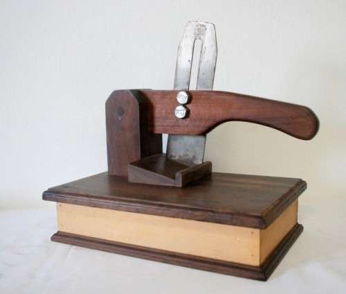 An awesome wooden biltong cutter with a pullout board , perfect in the bar area or in the lapa etc!