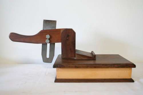 An awesome wooden biltong cutter with a pullout board , perfect in the bar area or in the lapa etc!