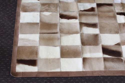**RS17** A stunning rectangular (1,8m x 1,07m) Springbok hide rug/ mat with hand stitched detailing