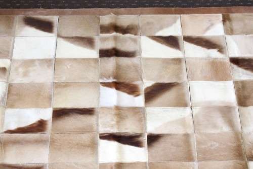 **RS17** A stunning rectangular (1,8m x 1,07m) Springbok hide rug/ mat with hand stitched detailing