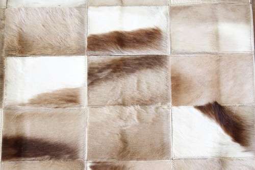 **RS17** A stunning rectangular (1,8m x 1,07m) Springbok hide rug/ mat with hand stitched detailing