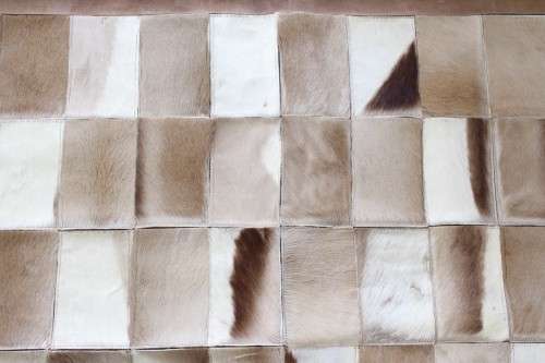 **RS17** A stunning rectangular (1,8m x 1,07m) Springbok hide rug/ mat with hand stitched detailing