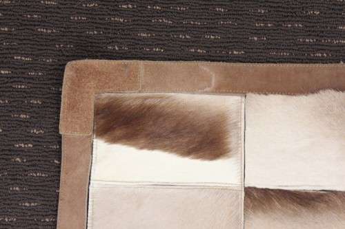 **RS17** A stunning rectangular (1,8m x 1,07m) Springbok hide rug/ mat with hand stitched detailing