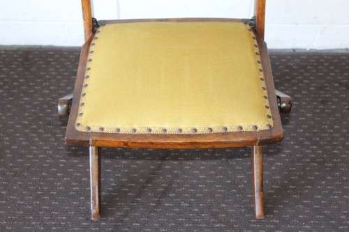 **RS17_Clearance** Antique Victorian solid teak folding chair w/ upholstered seat & spindle backrest