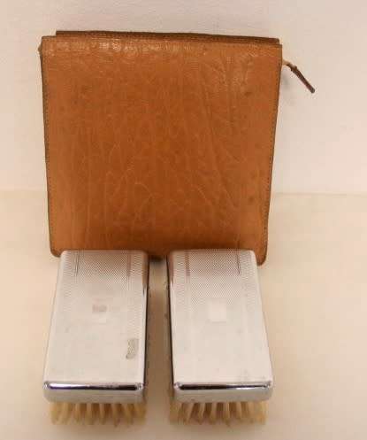 **RS17** A stunning Chromium plated, made in England gentlemans vanity/clothes brush set in a pouch.