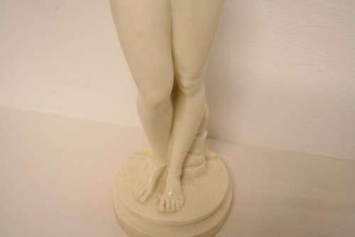 A fantastic large oxylite figurine of a woman carrying a water pitcher. Beautiful on display!!