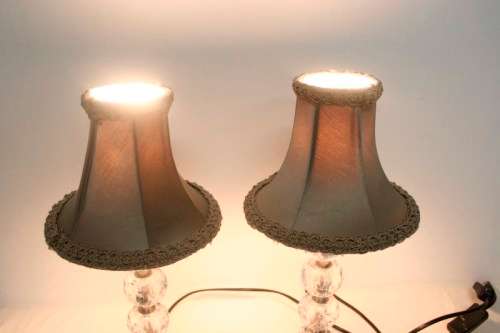 Two lovely table lamps with gorgeous lampshades and glass like bases; Stunning in all living areas!