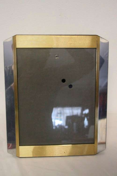 **RS17** A stunning medium sized silver and gold coloured free standing photo frame with glass.