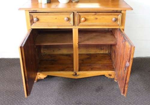 A stunning original solid Oregon 2-door server cabinet with two drawers and ample storage space