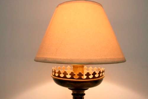 A magnificent tall decorative brass table lamp with a shade; Stunning in all living areas!