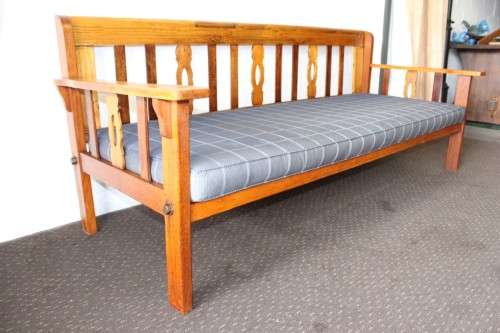 A very charming 3-seater solid Oregon daybed with an upholstered cushion - perfect for sun room!