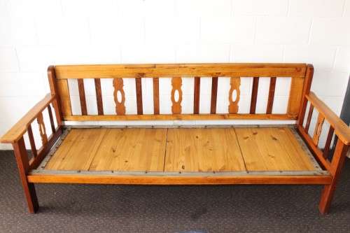 A very charming 3-seater solid Oregon daybed with an upholstered cushion - perfect for sun room!