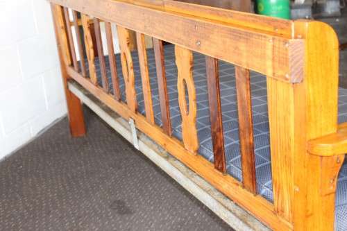 A very charming 3-seater solid Oregon daybed with an upholstered cushion - perfect for sun room!