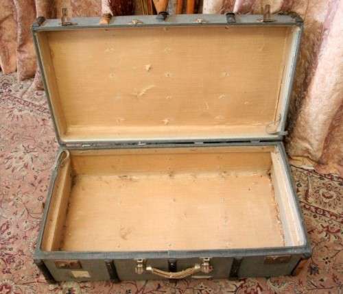 A fabulous, large vintage suitcase/ travel trunk - ideal for extra storage in the house/ display