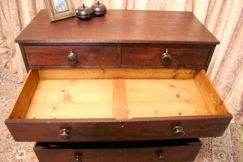 **RS17** A stylish vintage Teak 5-drawer (two over three) chest of drawers with round wood handles