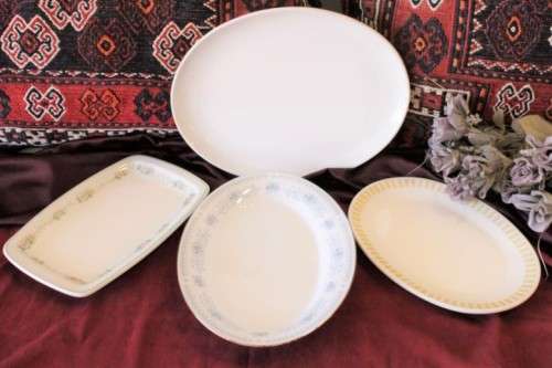 A gorgeous set of four assorted oval food platters in great condition - no chips or cracks
