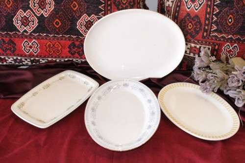 A gorgeous set of four assorted oval food platters in great condition - no chips or cracks
