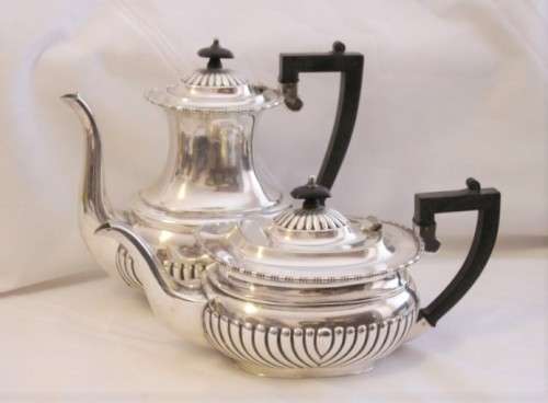 A beautiful antique silver plated tea set incl. 6-cup teapot and coffee pot, sugar bowl & creamer