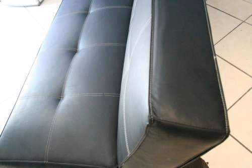 **RS17_Clearance** A fantastic & extremely well made (1.8m long) faux leather sleeper couch