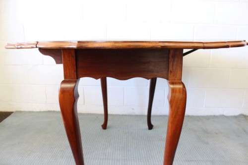 A stunning vintage solid imbuia drop-leaf dining table with beautiful slender Queen Anne legs