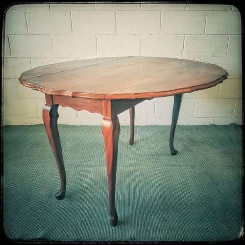 A stunning vintage solid imbuia drop-leaf dining table with beautiful slender Queen Anne legs