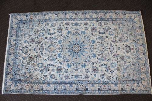 A stunning blue and white Tabriz Persian carpet in light & dark blue, white, cream & touches of red