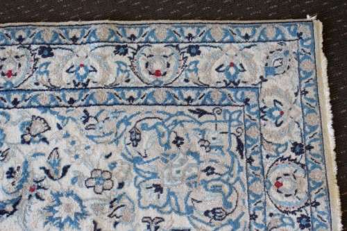 A stunning blue and white Tabriz Persian carpet in light & dark blue, white, cream & touches of red
