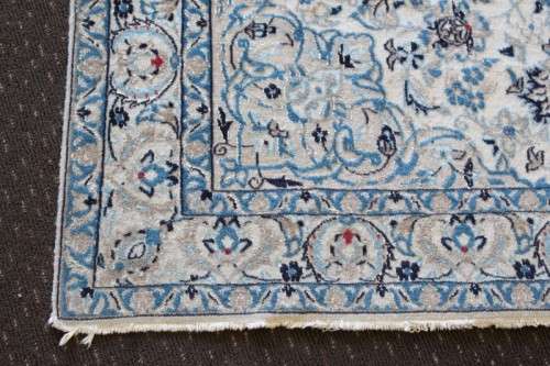 A stunning blue and white Tabriz Persian carpet in light & dark blue, white, cream & touches of red