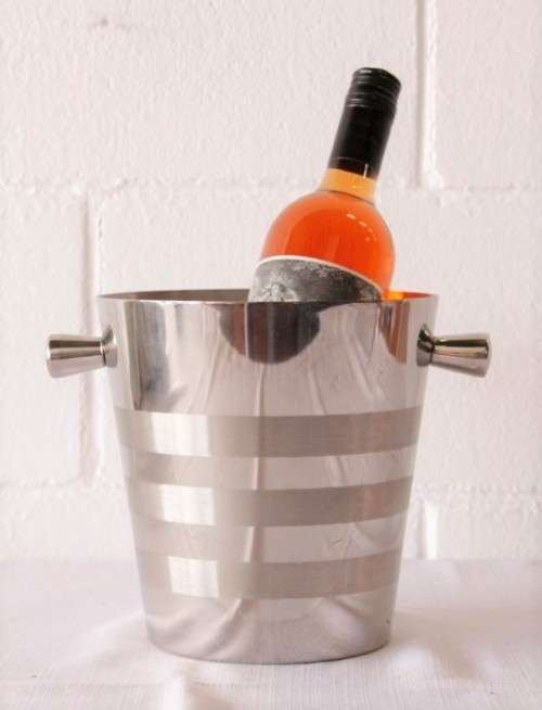A stunning double-handle stainless steel wine cooler/ ice bucket with a lovely etched pattern