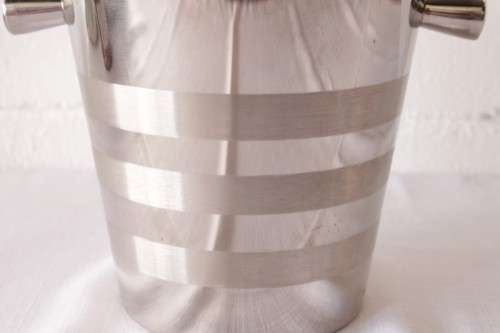 A stunning double-handle stainless steel wine cooler/ ice bucket with a lovely etched pattern