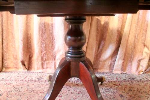 A fabulous stylish vintage drop leaf occasional table with ornate brass capped feet on castors