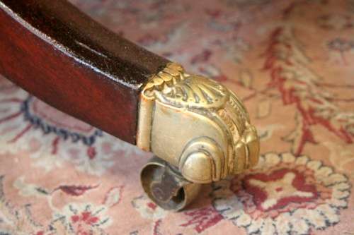 A fabulous stylish vintage drop leaf occasional table with ornate brass capped feet on castors