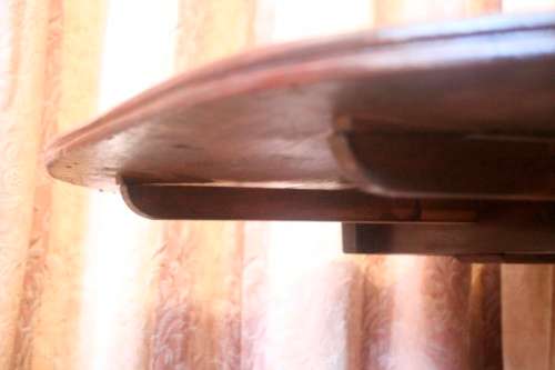 A fabulous stylish vintage drop leaf occasional table with ornate brass capped feet on castors