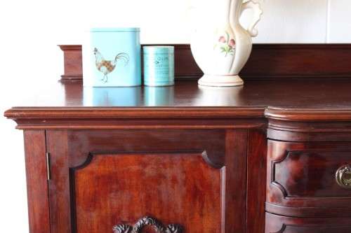 An exquisite LARGE vintage side server with pad foot legs and stunning carved wooden rosettes!