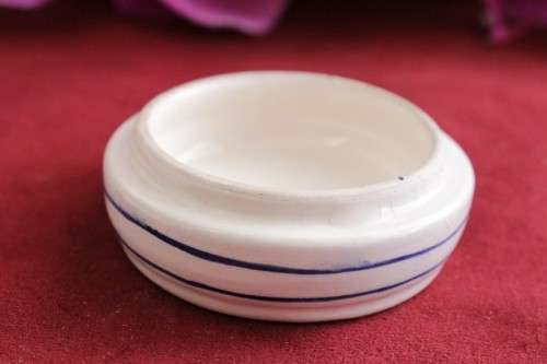 **RS17** A hand painted blue and white lidded gem/ trinket bowl with a floral pattern on the lid