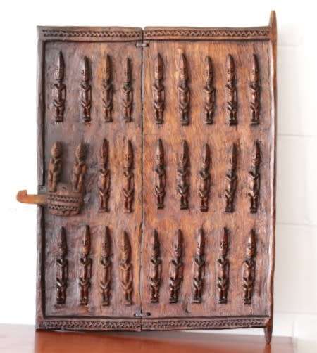 **RS17** A hand carved vintage/ antique? West African (Mali) "Dogon" granary door with sliding latch