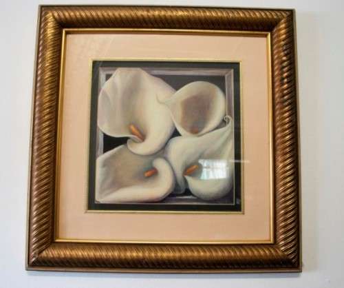 An exquisite signed "JM" print framed behind glass of four Arum Lilies. Stunning in all areas.