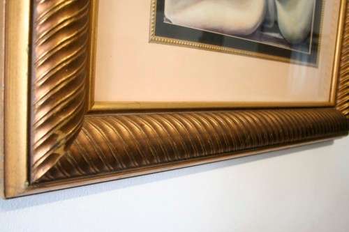 An exquisite signed "JM" print framed behind glass of four Arum Lilies. Stunning in all areas.