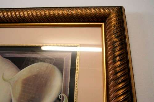 An exquisite signed "JM" print framed behind glass of four Arum Lilies. Stunning in all areas.