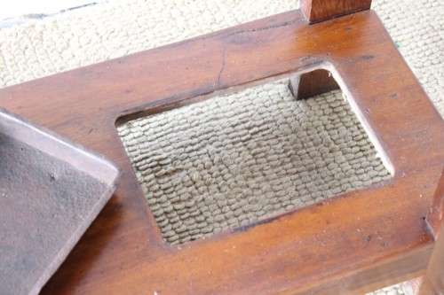 An incredible solid teak and solid blackwood combination hall stand with a bevelled mirror & drawer