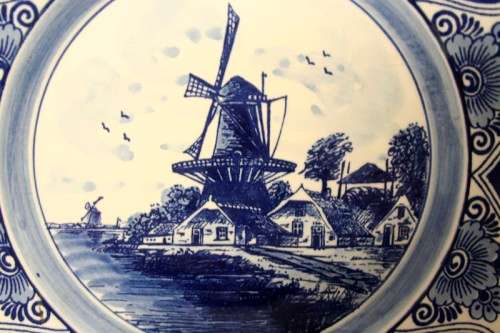 A gorgeous large original "Delft Blue" blue & white porcelain collectable plate w/ a wall hanger