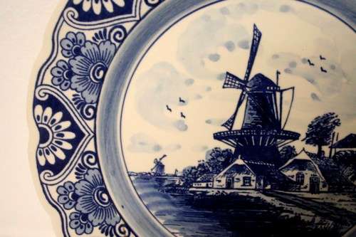 A gorgeous large original "Delft Blue" blue & white porcelain collectable plate w/ a wall hanger