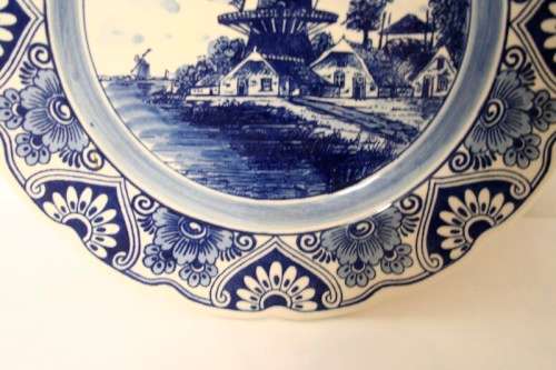 A gorgeous large original "Delft Blue" blue & white porcelain collectable plate w/ a wall hanger
