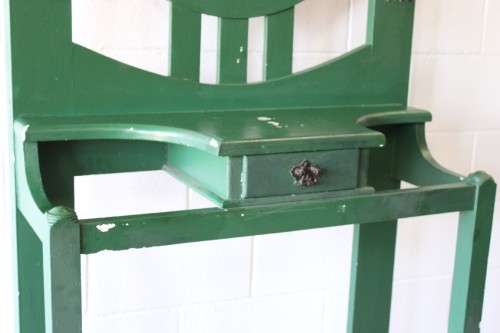 A lovely green painted hall stand w/a centre mirror, storage drawer & space for umbrellas/ canes etc