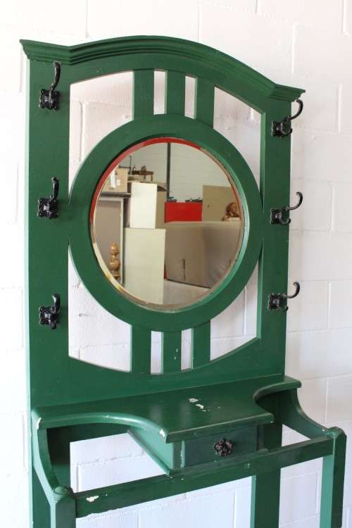 A lovely green painted hall stand w/a centre mirror, storage drawer & space for umbrellas/ canes etc