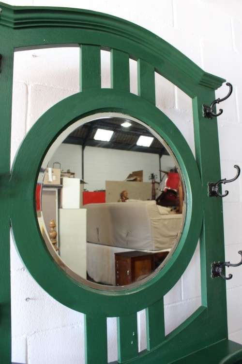 A lovely green painted hall stand w/a centre mirror, storage drawer & space for umbrellas/ canes etc