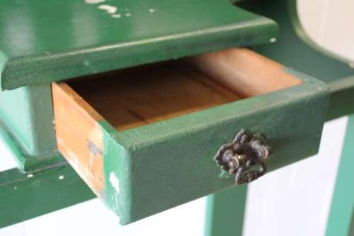 A lovely green painted hall stand w/a centre mirror, storage drawer & space for umbrellas/ canes etc