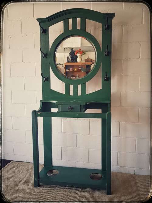A lovely green painted hall stand w/a centre mirror, storage drawer & space for umbrellas/ canes etc