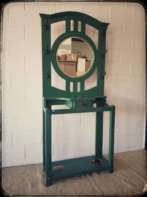 A lovely green painted hall stand w/a centre mirror, storage drawer & space for umbrellas/ canes etc