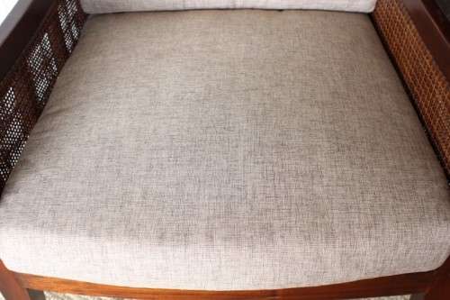 **RS17** A stylish solid mahogany & rattan armchair w/ matching ottoman with removable cushions